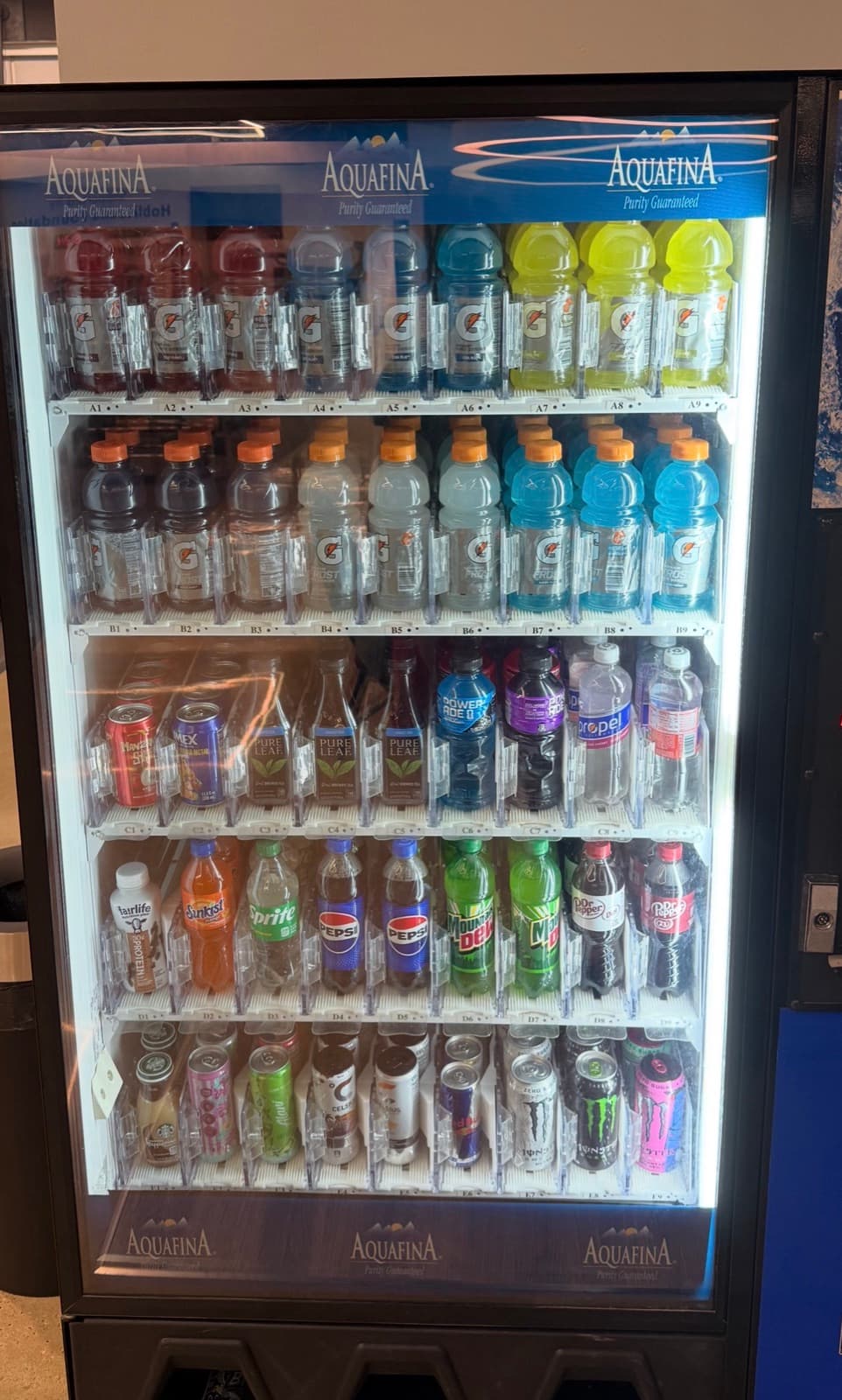 Beverage vending machine full of water, sports drinks and energy drinks